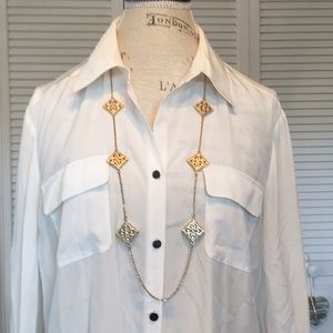 Long goldtoned filigree station necklace